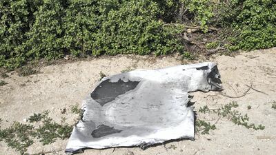 Debris from the tower lies at the side of Sheikh Zayed Road. Victor Besa / The National