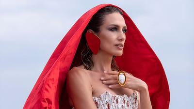 Mixing the drama of Little Red Riding Hood with beads of marble, crystal and red coral at Stephane Rolland for haute couture autumn / winter 2021.