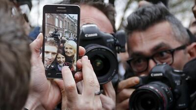 Marine Le Pen of the French far-right political party National Front poses for selfie after voting at a polling station in Henin-Beaumont during the second round of the regional elections France on December 13, 2015. Olivier Hoslet / EPA