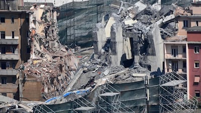 The demolition of the large towers '10' and '11' of the Morandi bridge using micro-explosive charges, in Genoa, northern Italy. EPA
