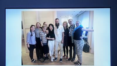 Freed hostage Johan Gustafsson (C) and his family at the Arlanda airport, Stockholm, after his arrival in Sweden, on June 26, 2017, after being held captive since 2011 by Al Qaeda in the Islamic Maghreb (AQIM) in Mali. Marcus Ericsson / EPA