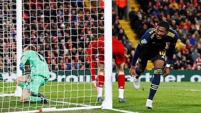 Arsenal's Ainsley Maitland-Niles celebrates after scoring their fourth goal. Reuters