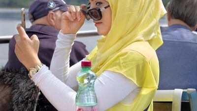 Accountant Fouzia travelled from Oman with her husband Hatam to see the alpine scenery.