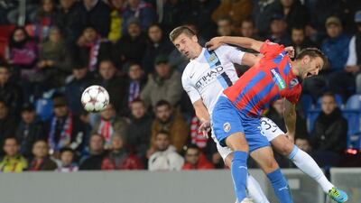 Pilzen's Marek Bakos, right, and Manchester City's Matija Nastasic vie for the ball during their Uefa Champions League Group D football match on Tuesday night. Michal Cizek / AFP
