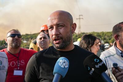 Raed Saleh, Minister of Emergency and Disaster Management, speaks during an interview near the village of Qastal Maaf in Latakia governate. Ahmad Fallaha for The National