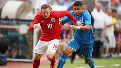 Wayne Rooney, left, has not been in goalscoring form in recent times. Richard Heathcote / Getty Images
