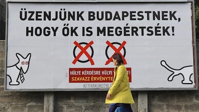 On October 1, 2016, the billboard poster in Budapest opposing the referendum on prime minister Viktor Orban's policy on migrants reads in Hungarian: "Let's send a message to Budapest, so they also understand! A stupid answer to a stupid question! Cast an invalid vote!" Vadim Ghirda / AP