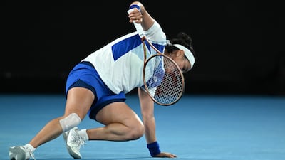 Jabeur takes a tumble during her second round match in Melbourne. EPA
