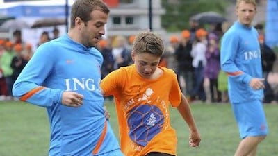 Rafael van der Vaart playing against Polish students. Pawel Ulatowski / Reuters