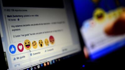 A computer screen displays the Facebook webpage with the new “Reactions” options as an extension of the “like” button, to give people more ways to easily signal how they feel. Facebook will begin testing this new feature allowing users in Ireland and Spain. AFP photo