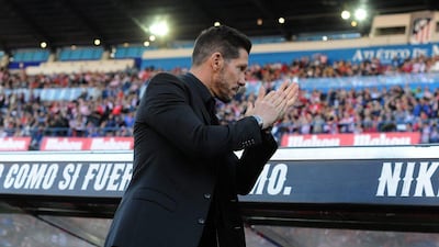 Manager Diego Simeone of Atletico Madrid applauds fans during the La Liga match between Atletico Madrid and Granada CF at Vicente Calderon Stadium on April 17, 2016 in Madrid, Spain. (Photo by Denis Doyle/Getty Images)