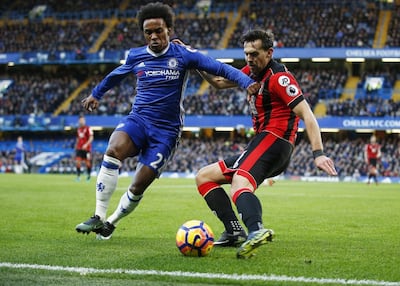 Chelsea midfielder Willian takes on Bournemouth’s Charlie Daniels. Peter Nicholls / Reuters