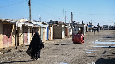 People pass through Al Hol camp in Al Hasakah, Syria. Getty Images