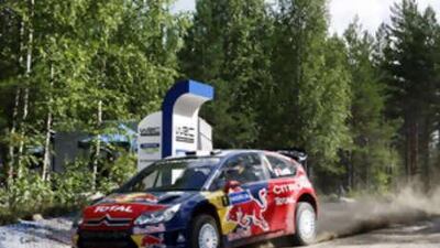 Citroen's French driver Sebastien Loeb holds on to a narrow lead over Mikko Hirvonen to win the rally in Finland.
