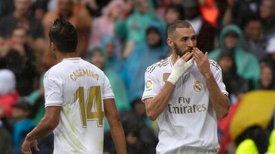 Real Madrid's French forward Karim Benzema celebrates after scoring his first goal after 25 minutes. AFP