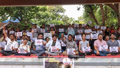 Doctors at at Jamshedjee Jeejeebhoy Hospital in Mumbai, western India, protest against the rape and killing of a colleague in Kolkata. EPA