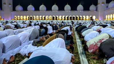 Thousands perform nighttime prayers.