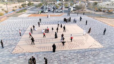 Volunteers set up a 20mx20m light installation, comprised of 2,000 solar lanterns.