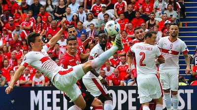 Fabian Schaer, left, of Switzerland in action during the UEFA EURO 2016 group A preliminary round match between Albania and Switzerland at Stade Bollaert-Delelis in Lens Agglomeration, France, 11 June 2016. EPA/MOHAMED MESSARA