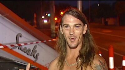 Daniel McConnell describes he helped police arrest a driver after a car crash next to his home in Brisbane, Australia, on November 24, 2016, while dressed only in his underpants. Australian Broadcasting Corporation via the AP