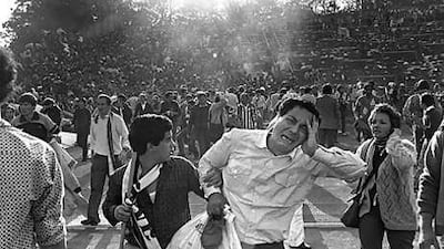 Supporters flee the scene of death and devastation in Heysel Stadium in Brussels.