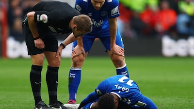 Everton's Demarai Gray rlies injured. Reuters