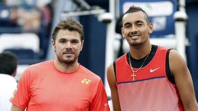 epa05182131 Stanislas Wawrinka (L) of Switzerland poses with Nick Kyrgios of Australia before their semi final match of the Dubai Duty Free Tennis ATP Championships in Dubai, United Arab Emirates, 26 February 2016. EPA/ALI HAIDER