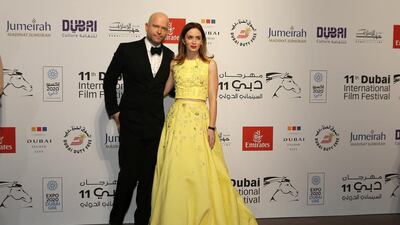 Mark Foster and Emily Blunt on the red carpet on the opening night of 11th Dubai International Film Festival. Pawan Singh / The National