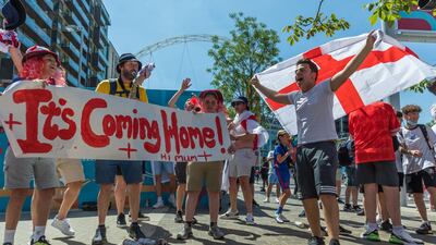 England fans chant Football’s Coming Home outside Wembley. Alamy
