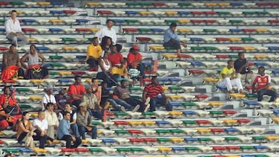 Violence in Genoa, top, and empty seats in Abu Dhabi.