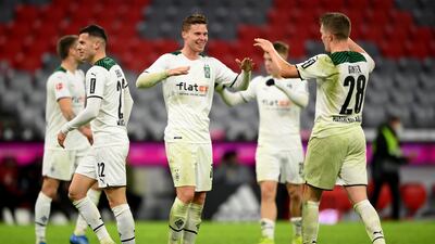 Nico Elvedi of Borussia Monchengladbach celebrates after the 2-1 win against Bayern Munich at Allianz Arena on January 07, 2022. Getty