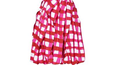 A deconstructed pleated skirt in pink and red.