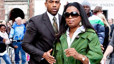 Oprah Winfrey wears a green rain coat in Copenhagen, Denmark on September 20, 2009. EPA