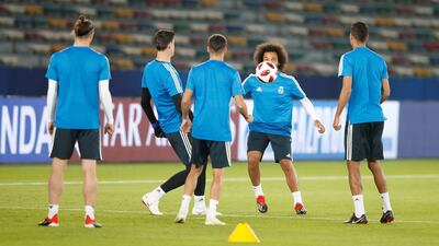 Real Madrid's players attend a training session at Zayed Sports City stadium in Abu Dhabi. EPA