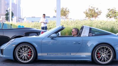 A Porsche 911 Targa in the parade. Khushnum Bhandari / The National