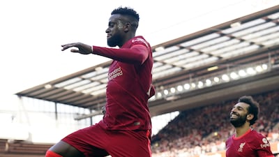 Divock Origi celebrates after scoring Liverpool's second. EPA