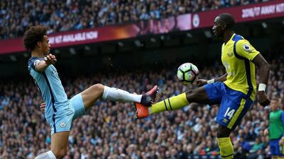 Manchester City’s Leroy Sane, left, is challenged by Everton’s Yannick Bolasie during their match at Etihad Stadium on Oct. 15 2016. Nigel Roddis / EPA