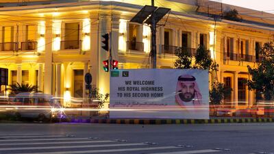 A billboard welcoming Mohammad Bin Salman on the eve of his visit, in Lahore. EPA