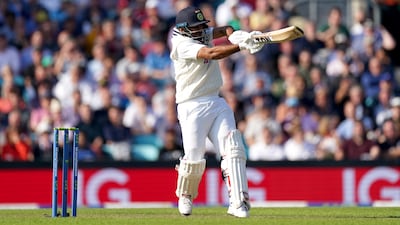 India's Shardul Thakur smashes a six off Ollie Robinson on his way to 57 off 36 balls. PA