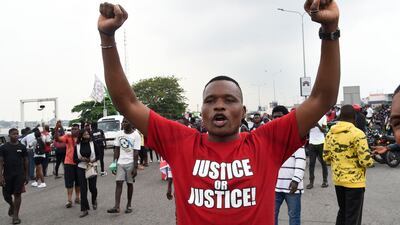 Hundreds of youths march, demanding justice. AFP