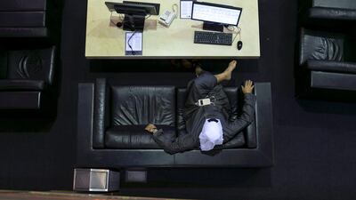 A trader at the floor of Dubai Financial Market. Reem Mohammed / The National