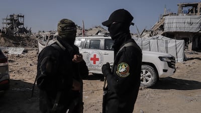 Hamas militants during a search for hostages in a refugee camp, in northern Gaza. Bloomberg