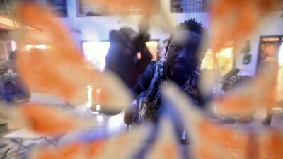 Ba normally keeps his subjects anonymous, so as to focus on themes rather than individuals, but for his next collection he said he might depict Senegal's president, Macky Sall. Cooper Inveen / Reuters