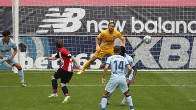 Athletic Bilbao's Iker Muniain, second left, beats Atletico goalkeeper Jan Oblak to open the scoring. EPA