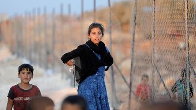 Newly displaced Syrian children arrive to a refugee camp in Atimah village, Idlib province, Syria September 11, 2018. Reuters