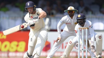 England cricketer Jos Buttler, left, scored a brilliant half-century against Sri Lanka on Sunday. AFP