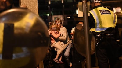 People are led to safety on Southwark Bridge away from London Bridge after an attack on June 4, 2017 in London, England. Carl Court / Getty Images