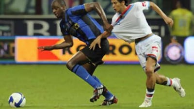 The Inter Milan midfielder Patrick Vieira, left, tussles for the ball with Catania's Marco Biagianti.