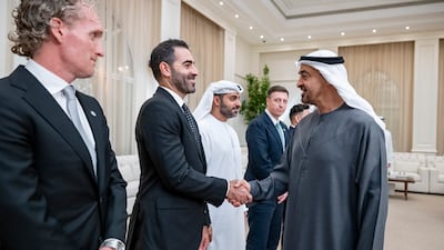 President Sheikh Mohamed receives a delegation from Ethara, the company responsible for organising the Formula One Etihad Airways Abu Dhabi Grand Prix. Abdulla Al Neyadi / UAE Presidential Court