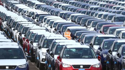New car sales in Britain have dropped by a fifth in a year. PA